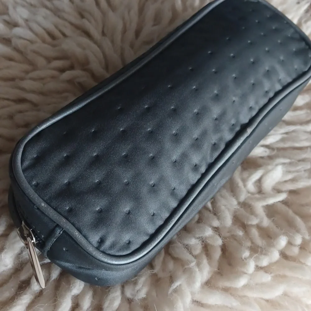 TUMI cosmetic bag